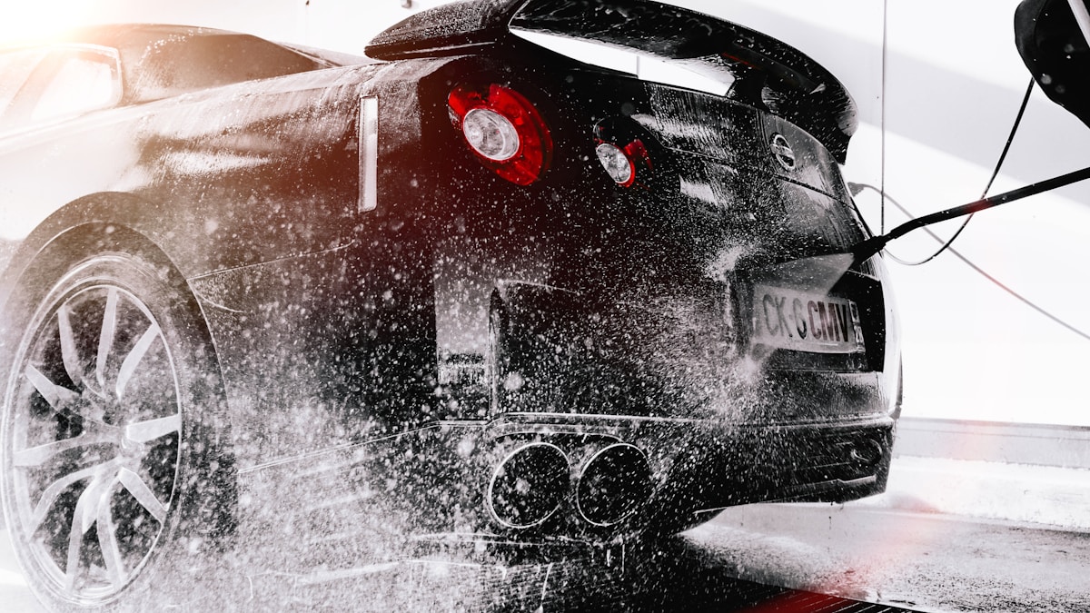 Luxury vehicle receiving a meticulous exterior wash at Emerald Vale